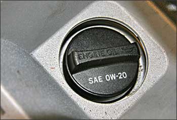 0W-20 oil weight specifications printed right on the oil filler cap